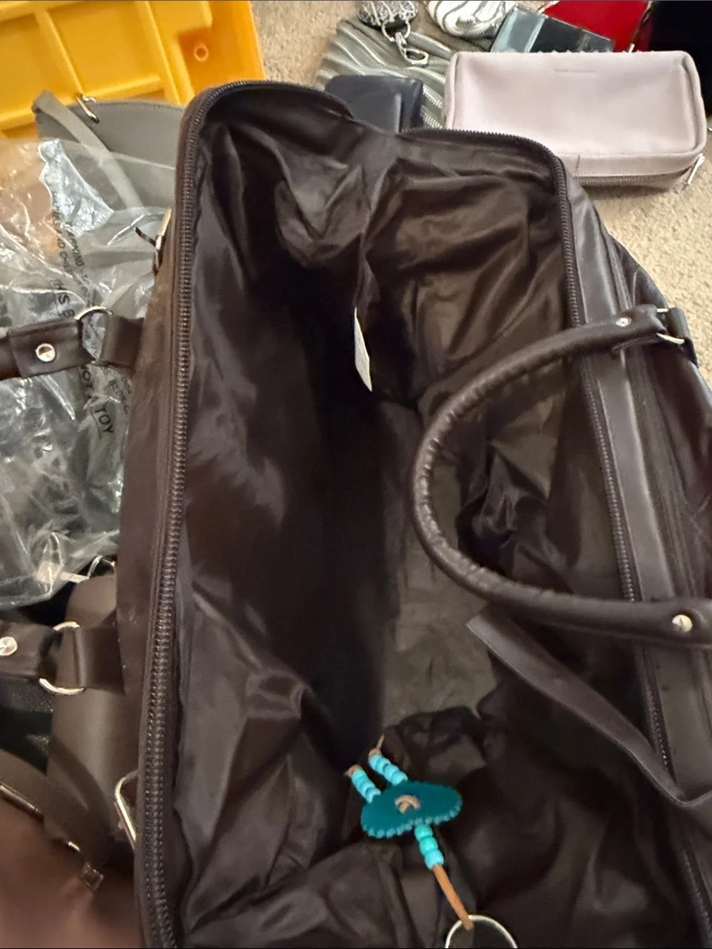 Men's Brown Leather Weekender Bag leather.